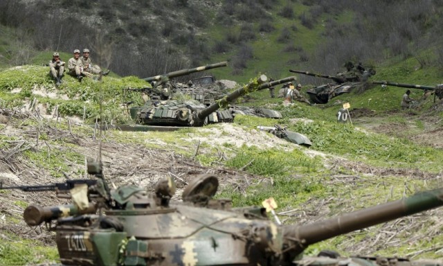 Servicemen of the self-defense army of Nagorno-Karabakh rest at their positions near the village of Mataghis April 6, 2016. REUTERS/Staff